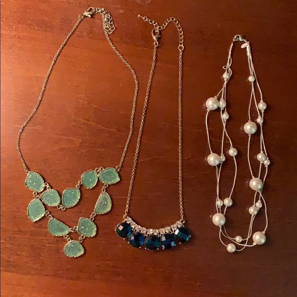 Three statement necklaces